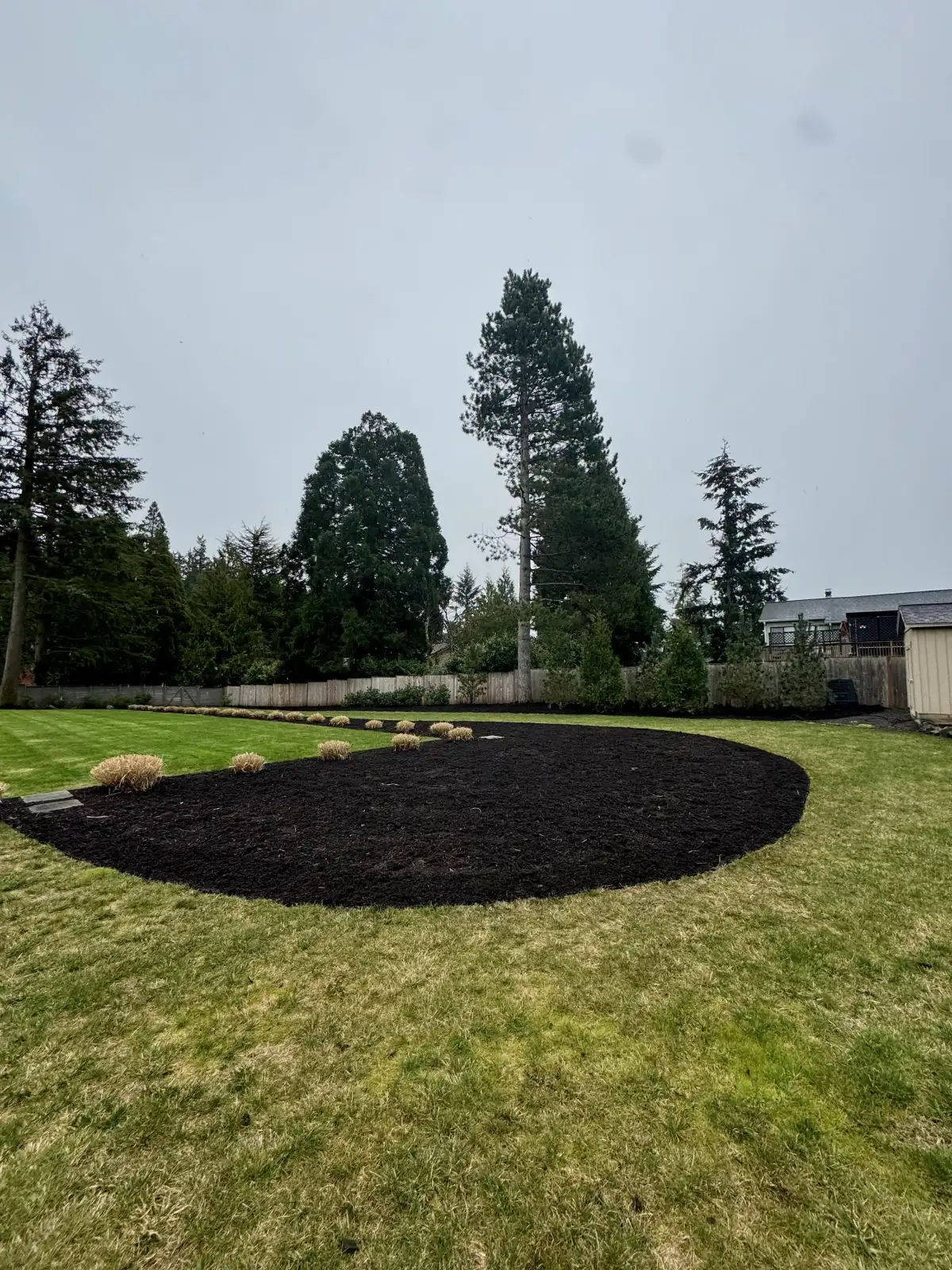 Fresh mulch installation in Oregon landscape beds