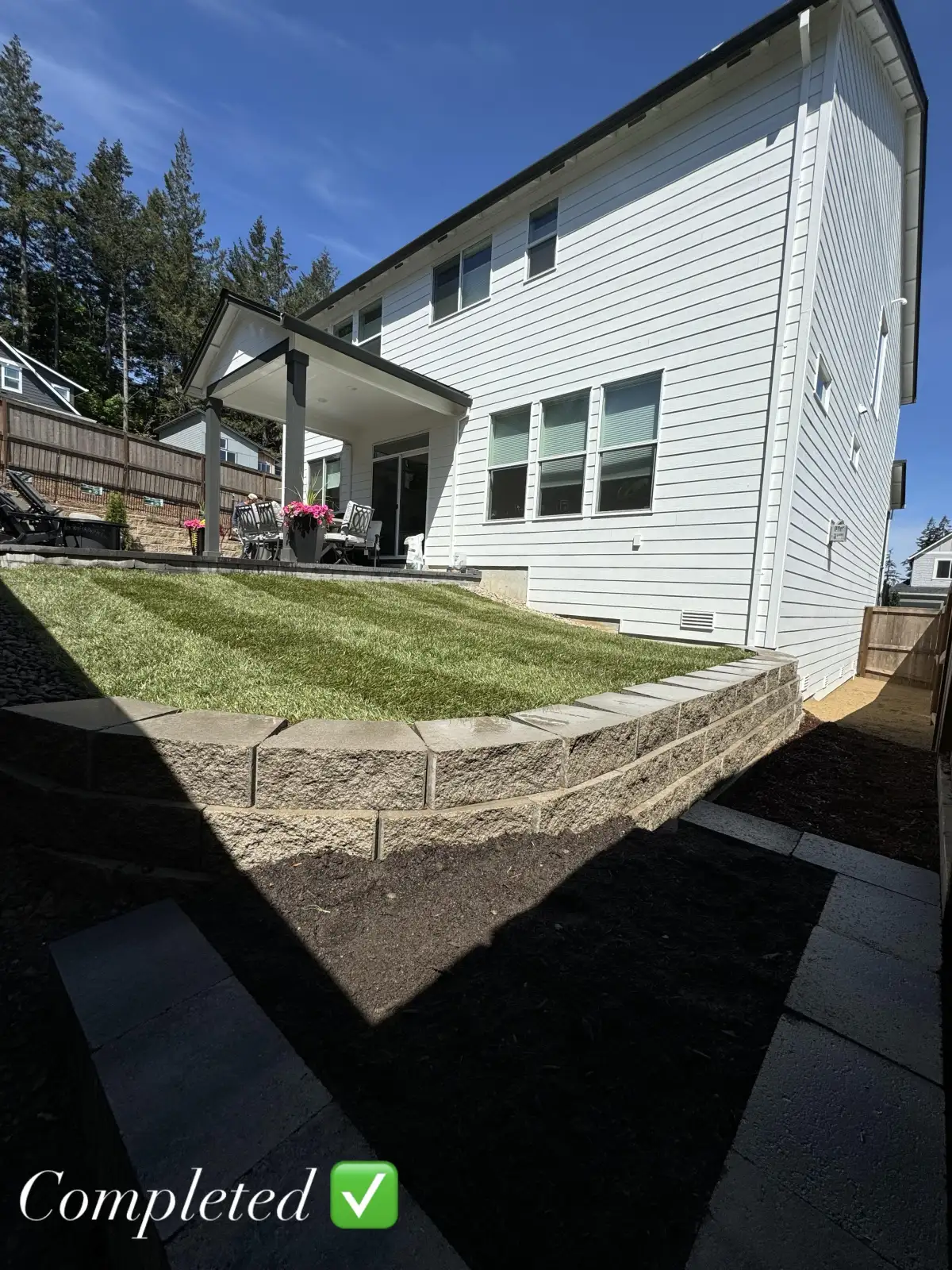 Structural retaining wall on a Happy Valley hillside